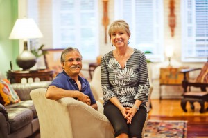 Pat McCarty and her husband, Javid Mahajan, in their living room