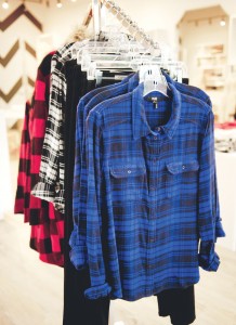 At Alice Jane, Paige plaid shirts, $169, are displayed with AG super-skinny black jeans, $178, and a BB Dakota plaid coat with faux fur collar, $130. 