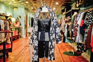 A downtown look at Doubledutch, including a vegan-suede patchwork skirt by Cotton Candy,$47; faux leather top, $61, and floral coat, $149, both by BB Dakota; and a showstopper of a statement necklace in brass with pyrite, $50.