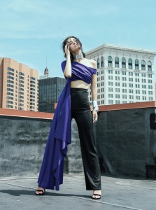 Purple wrap top with fitted black pants. "Classy lady but futuristic," Bishme says. 