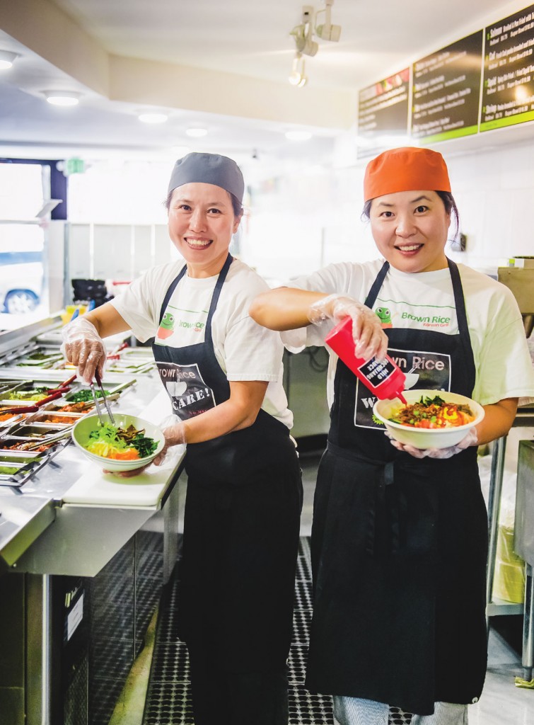 Sisters Unmi Kim, left, and Heather Chung believe food should be prepared with a smile.
