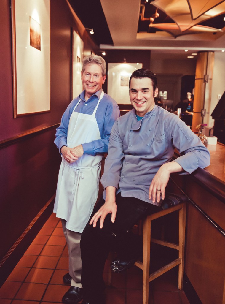 John Shields (left) and Doug Wetzel take a work break at the Gertrude’s bar counter. 