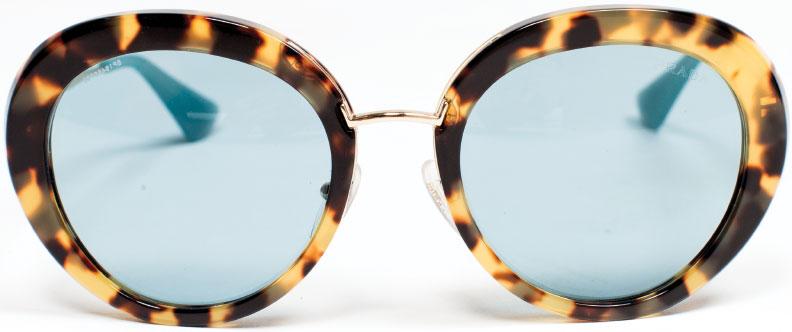 PRADA, PRADA, PRADA Round tortoiseshell glasses are back big time, but we prefer this shaded Prada pair that creates a more cosmopolitan persona. For your choosiest giftee. $375, at Handbags in the City in Harbor East.