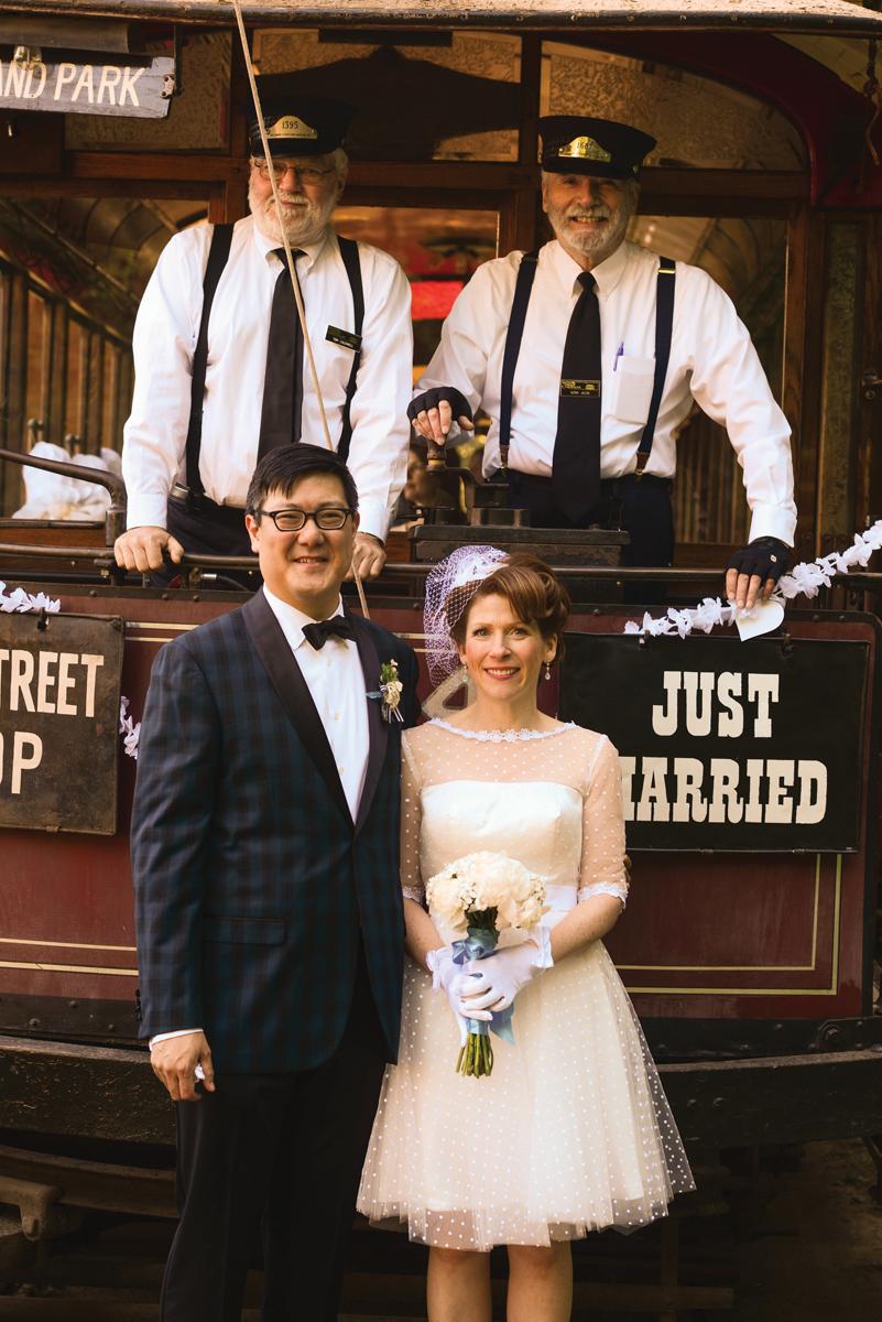 They said "I do!" Howard Yang and Kathy Flann, and their friendly trolley conductors for the evening.
