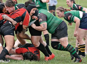 Lauren Harris (front, right) of the Chesapeake Ospreys clashes with an opponent from the Maryland Stingers during a rugby football game April 23 at Frank C. Bocek Park in Baltimore.