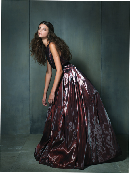 Shine Wine. Marsala draped one-shoulder ball gown made of liquid satin with asymmetrical metal belt by Romona Keveza Collection, $7,990 at Francesca’s Atelier, Green Spring Station. Amethyst teardrop earrings by Assil New York, $6,240 at Radcliffe Jewelers, Pikesville.