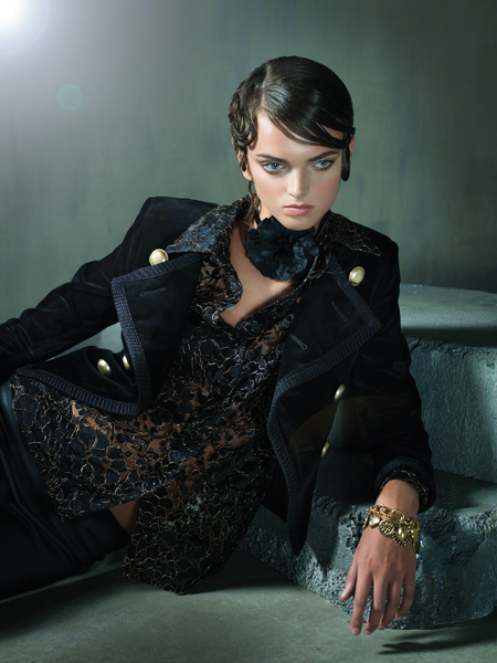 Black Russian. Black cropped velvet jacket with gold buttons, $3,490 and black and gold lace blouse, $1,690; both by Saint Laurent Paris at Saks Fifth Avenue, Chevy Chase. Flower choker with metallic pinstripe and velvet ribbon by Jill Andrews Gowns, $75 at Jill Andrews Gowns, Hampden. Black stretch leather pants by Helmut Lang, $920 at Saks Fifth Avenue, Chevy Chase. Charm bracelet by Yoshi, $64 at The Little Shoebox, Ruxton. 