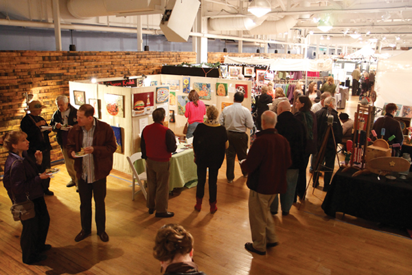 holiday shoppers mingle amid Bazaart booths in the Jim Rouse Visionary Center